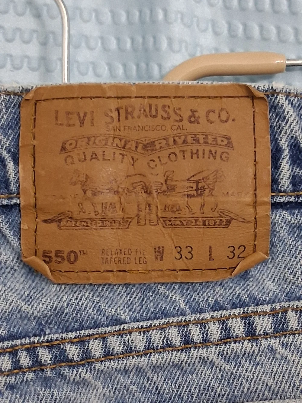 Vintage Orange Tab 550 Levi's Straight-Leg Jeans in Light Blue Denim
